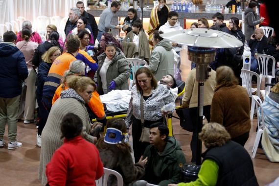 People affected by a deadly train derailment are transferred and treated at the Caseta Municipal in the town of Adamuz, after a high-speed train derailed and collided with another approaching train near Cordoba, Spain, January 18, 2026. REUTERS/Alex Gallegos TPX IMAGES OF THE DAY