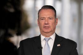 Todd Lyons, acting director of the US Immigration and Customs Enforcement (ICE) agency, is interviewed on TV on the White House grounds on November 3, 2025 in Washington.